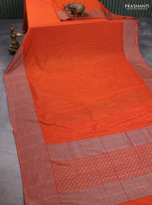 Banarasi semi crepe saree orange with allover thread & zari woven buttas and zari woven border