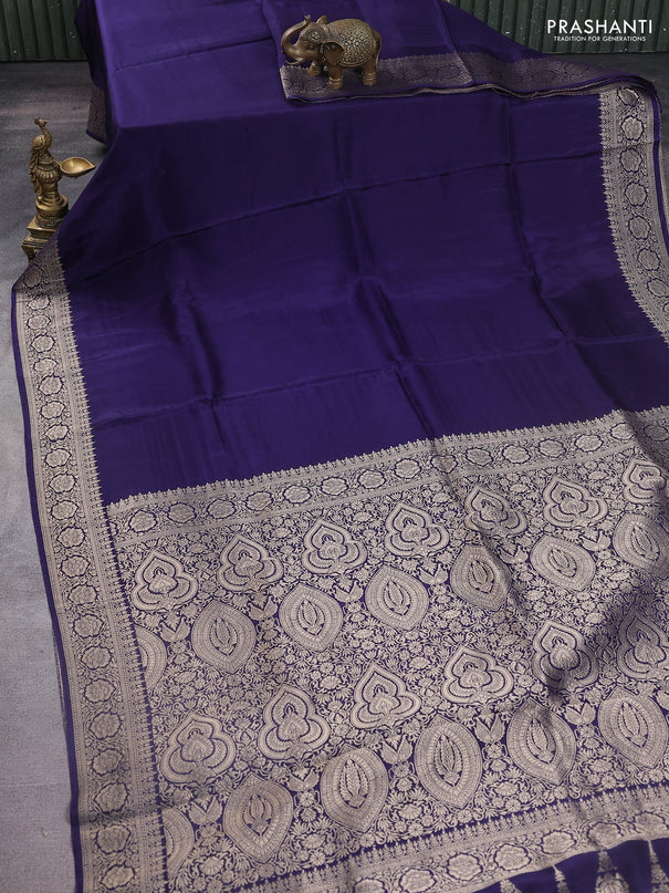 Dola silk saree navy blue with plain body and zari woven border