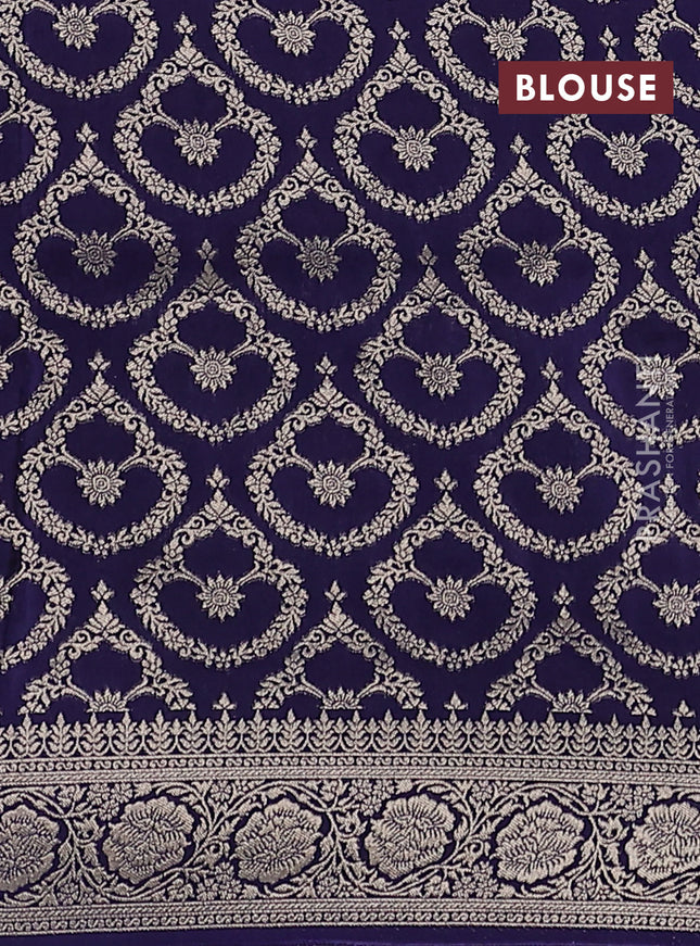 Dola silk saree navy blue with plain body and zari woven border