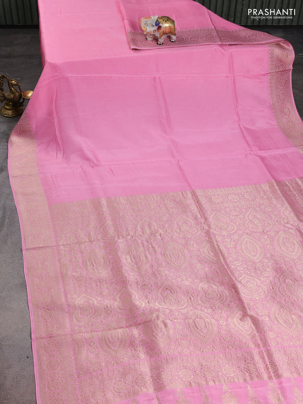 Dola silk saree light pink with plain body and zari woven border