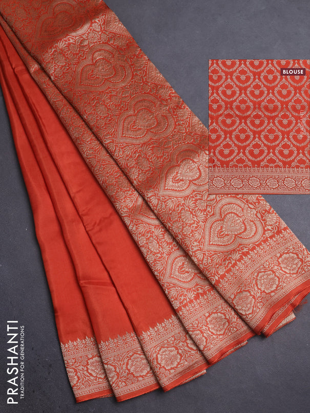 Dola silk saree orange with plain body and zari woven border