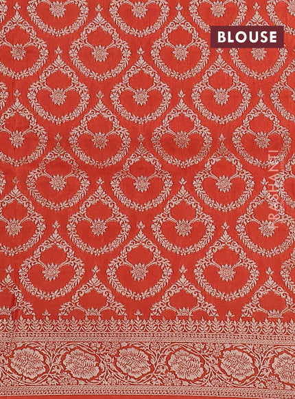 Dola silk saree orange with plain body and zari woven border