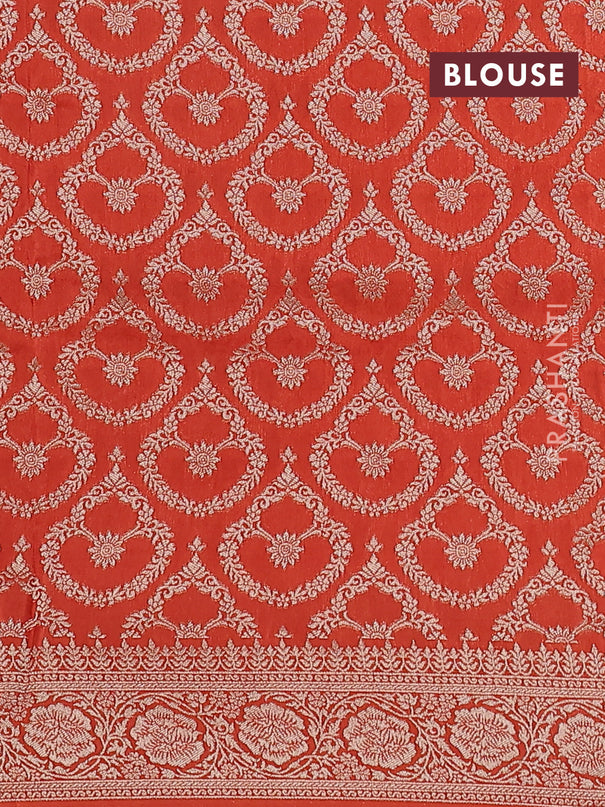 Dola silk saree orange with plain body and zari woven border