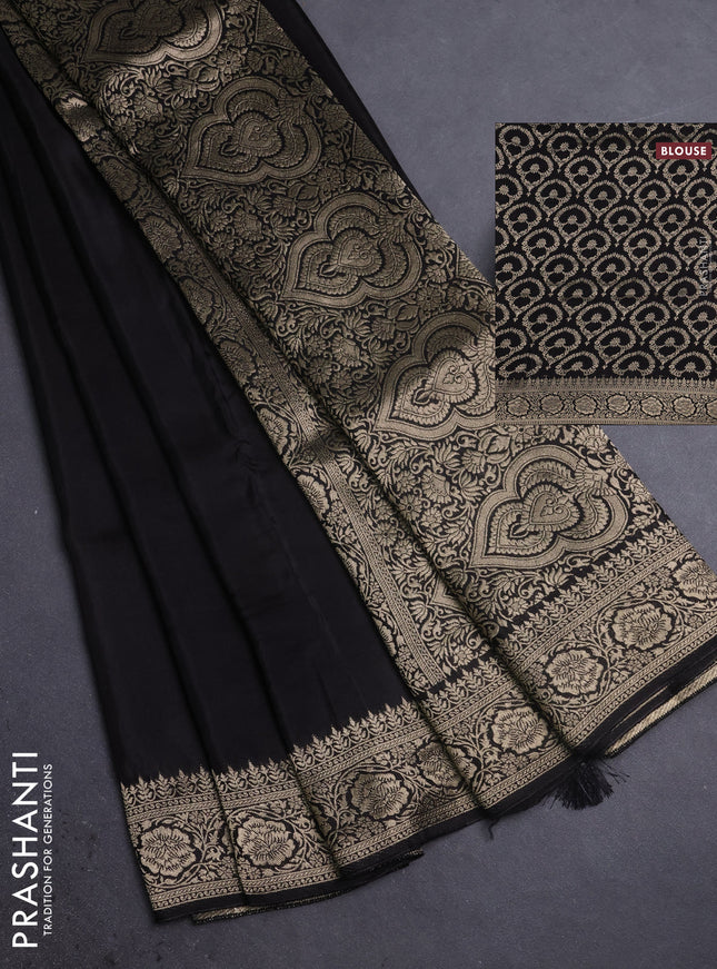 Dola silk saree black with plain body and zari woven border