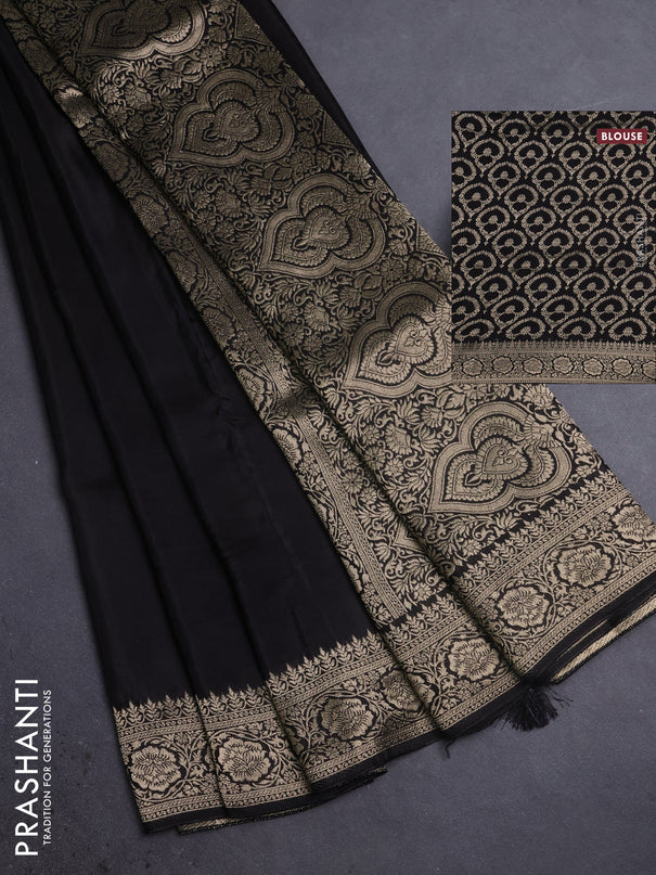 Dola silk saree black with plain body and zari woven border