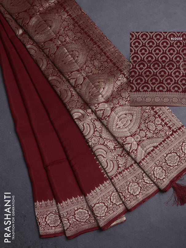 Dola silk saree maroon with plain body and zari woven border