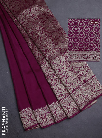 Dola silk saree wine shade with plain body and zari woven border
