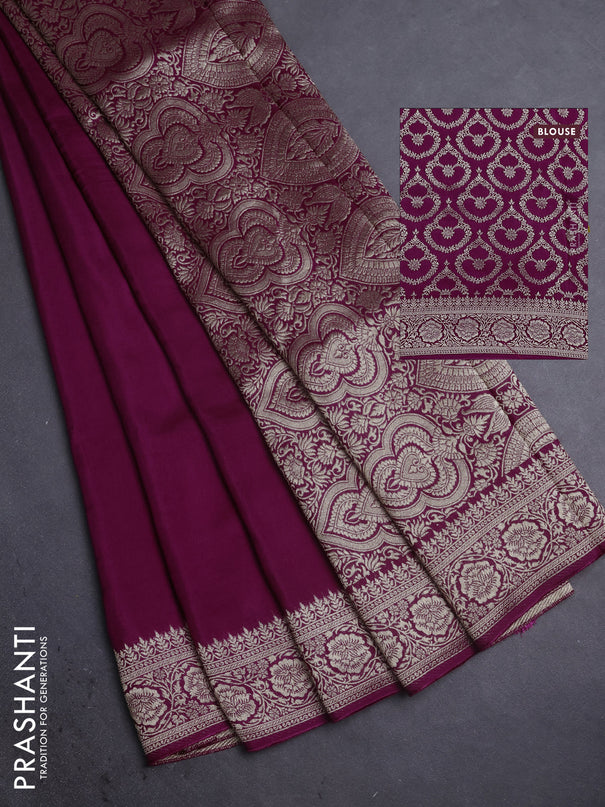 Dola silk saree wine shade with plain body and zari woven border