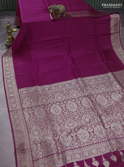 Dola silk saree wine shade with plain body and zari woven border