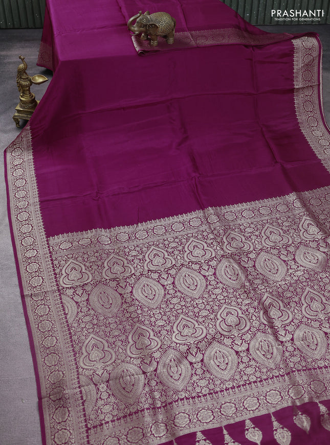 Dola silk saree wine shade with plain body and zari woven border