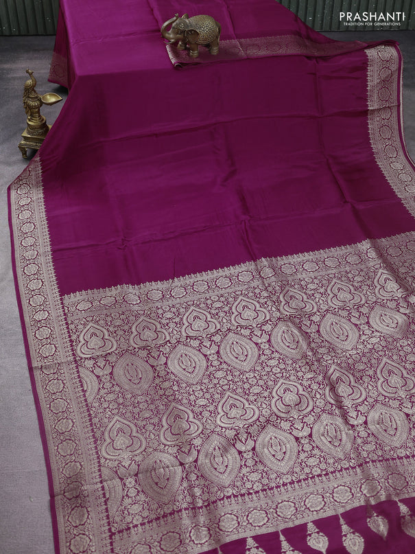 Dola silk saree wine shade with plain body and zari woven border