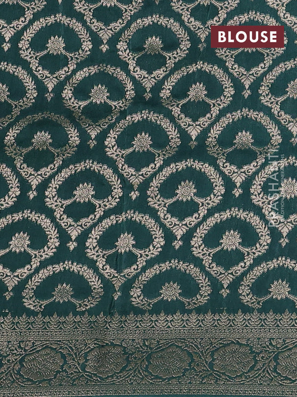 Dola silk saree peacock green shade with plain body and zari woven border