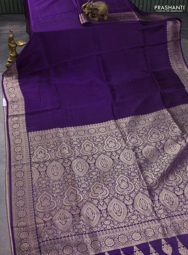 Dola silk saree violet with plain body and zari woven border