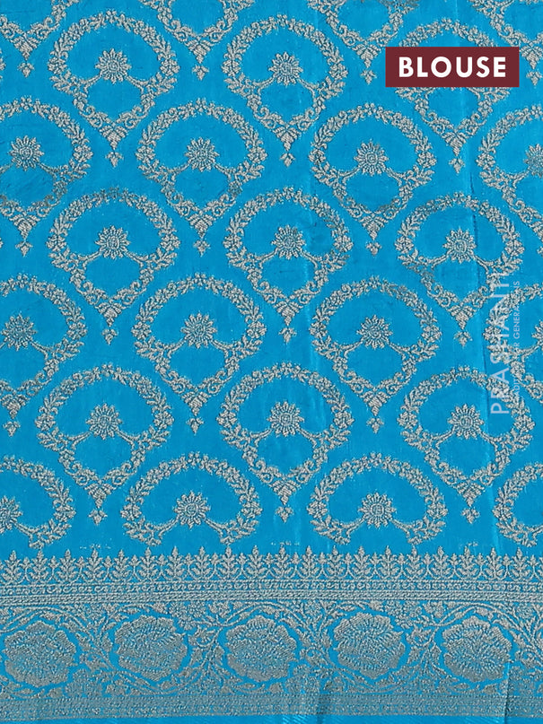 Dola silk saree teal blue with plain body and zari woven border