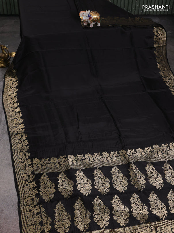 Dola silk saree black with plain body and zari woven border