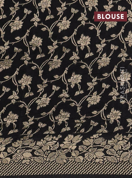 Dola silk saree black with plain body and zari woven border