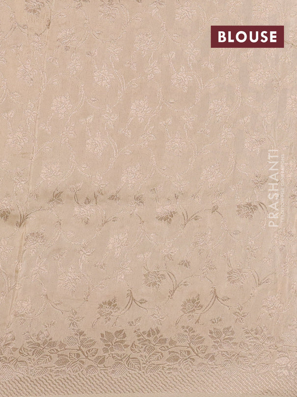 Dola silk saree cream with plain body and zari woven border