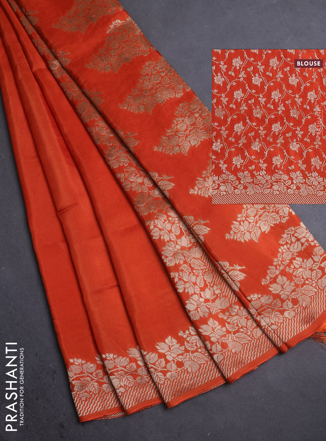 Dola silk saree orange with plain body and zari woven border
