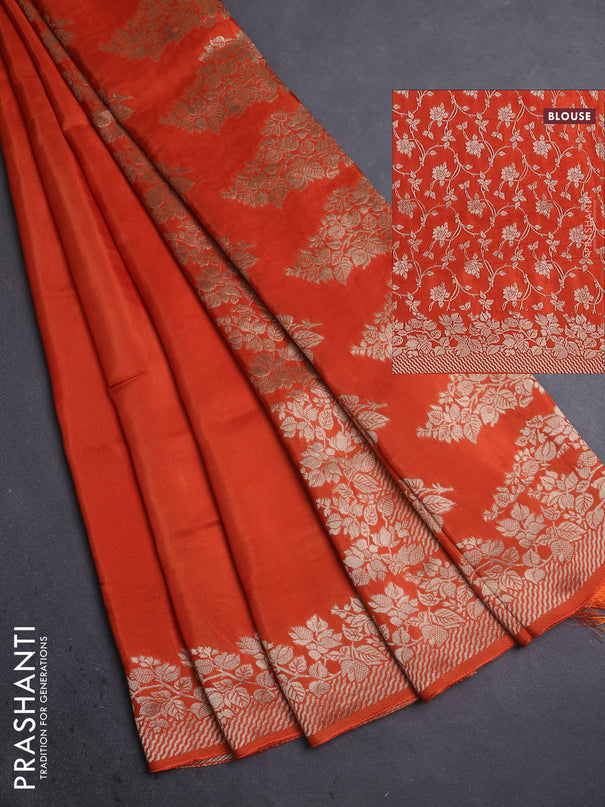 Dola silk saree orange with plain body and zari woven border