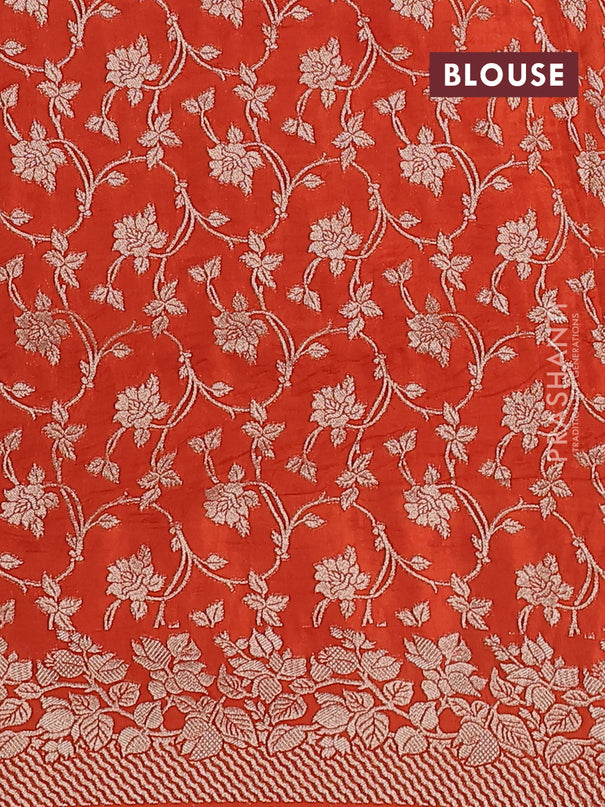 Dola silk saree orange with plain body and zari woven border