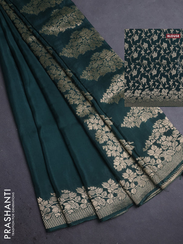Dola silk saree peacock green shade with plain body and zari woven border