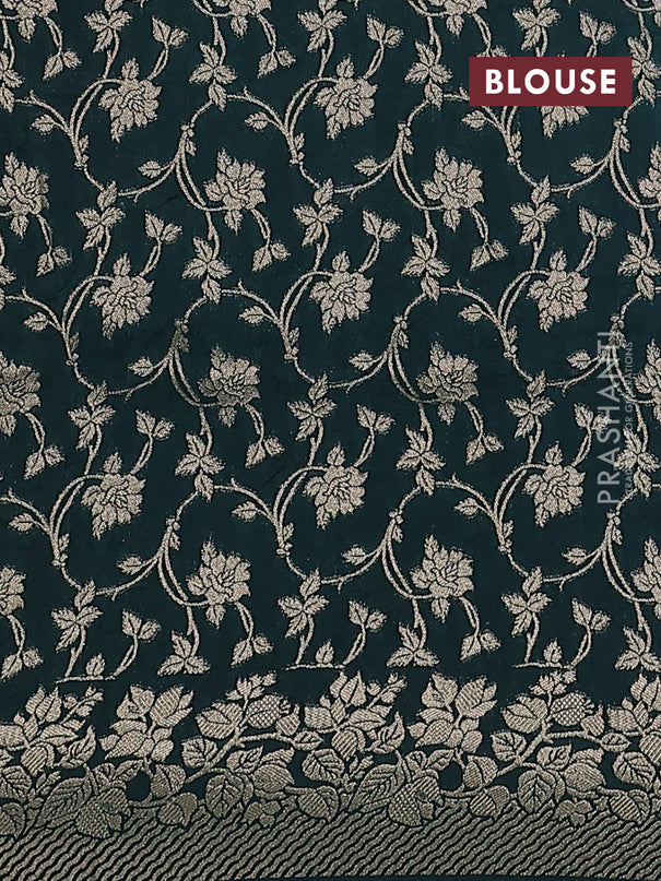 Dola silk saree peacock green shade with plain body and zari woven border