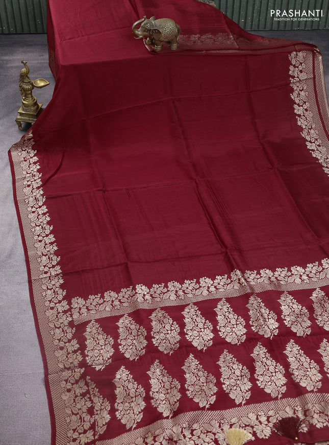 Dola silk saree deep maroon with plain body and zari woven border
