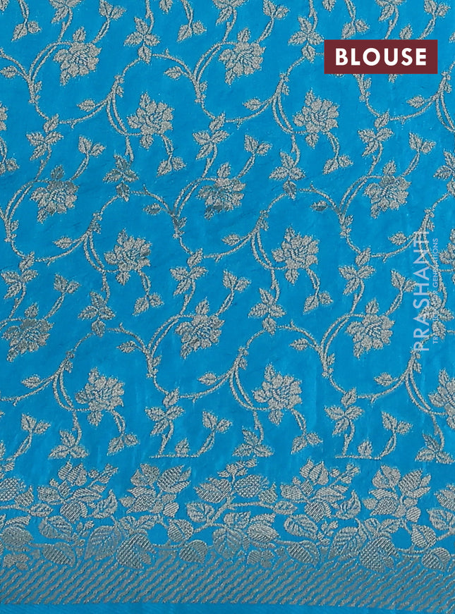 Dola silk saree teal blue with plain body and zari woven border