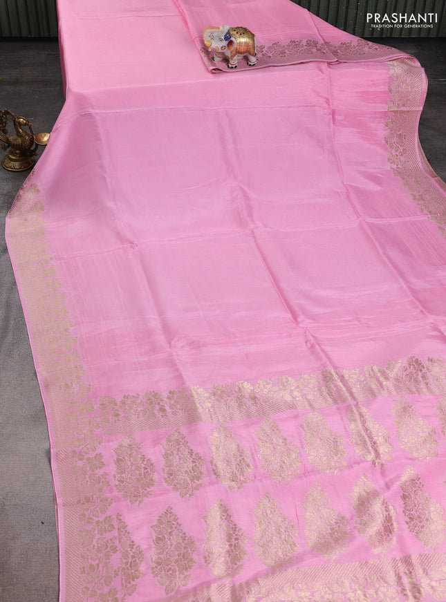 Dola silk saree light pink with plain body and zari woven border