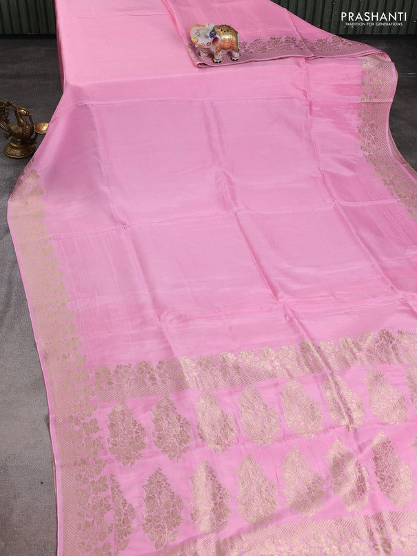 Dola silk saree light pink with plain body and zari woven border