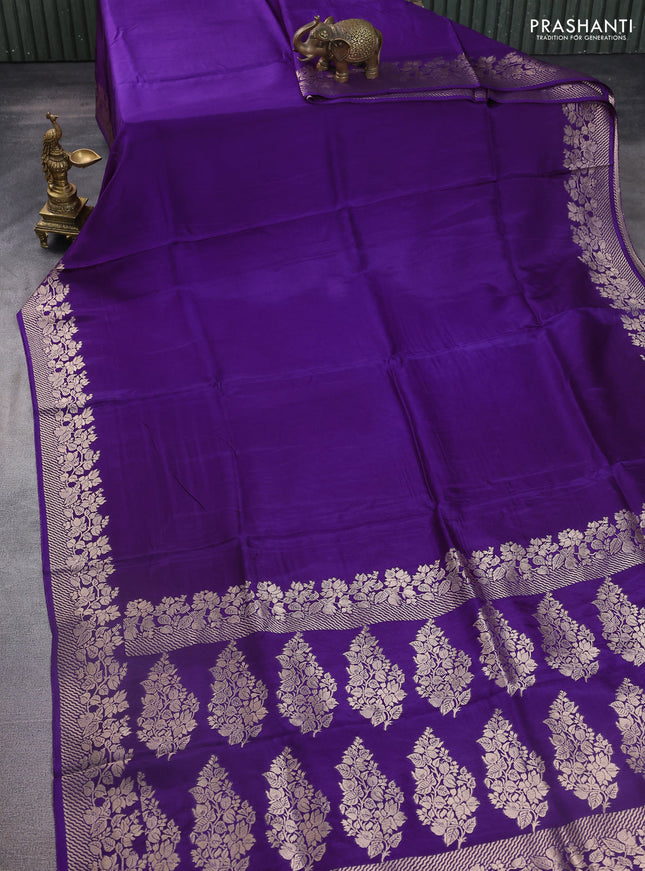 Dola silk saree violet with plain body and zari woven border