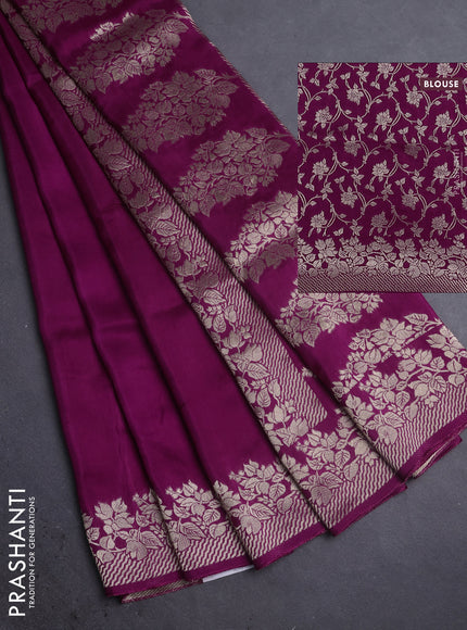 Dola silk saree wine shade with plain body and zari woven border
