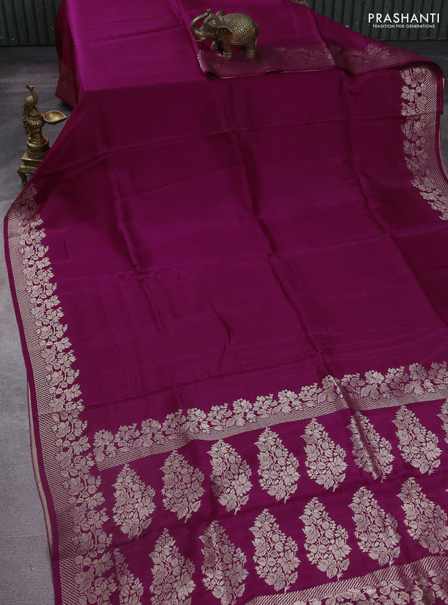 Dola silk saree wine shade with plain body and zari woven border