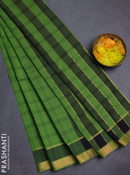 Mangalgiri cotton saree green and black with allover checked pattern and rettapet zari woven border