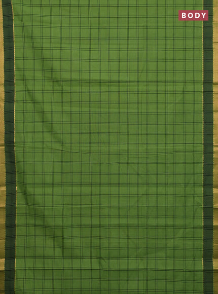 Mangalgiri cotton saree green and black with allover checked pattern and rettapet zari woven border