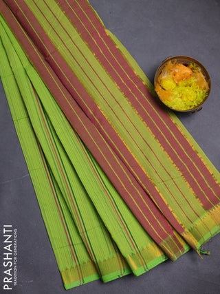 Mangalgiri cotton saree fluorescent green and pink with allover stripe pattern and zari woven border