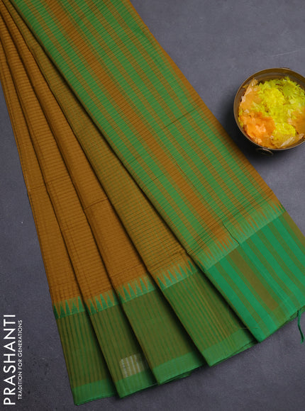 Mangalgiri cotton saree dark mustard and green with allover small checked pattern and temple design simple border