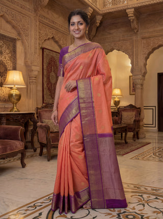 Kora kanchipuram silk saree peach shade and purple with zari woven buttas and rich zari woven border