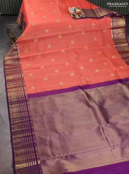 Kora kanchipuram silk saree peach shade and purple with zari woven buttas and rich zari woven border