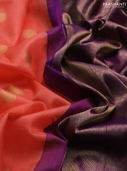 Kora kanchipuram silk saree peach shade and purple with zari woven buttas and rich zari woven border