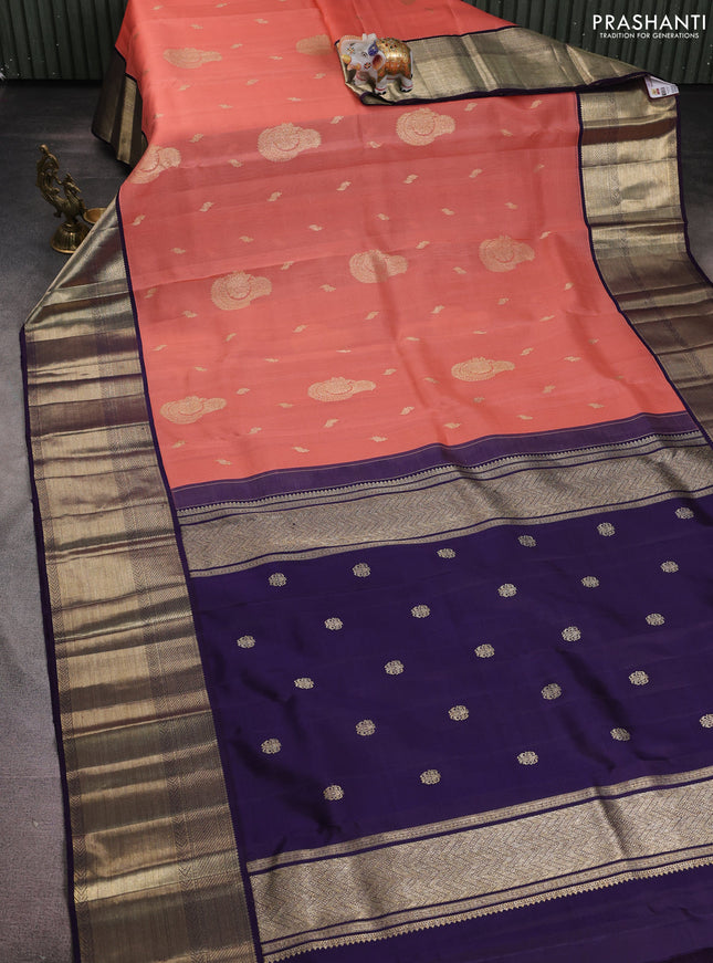 Kora kanchipuram silk saree dark peach and navy blue with zari woven buttas and long rich zari woven border