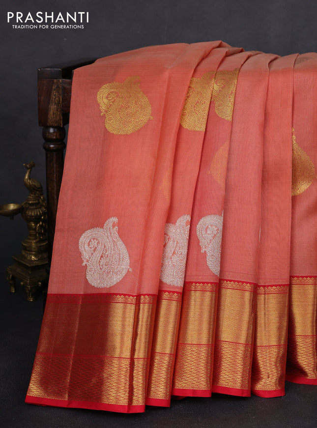 Kora kanchipuram silk saree peach oeange and red with zari woven buttas and rich zari woven border