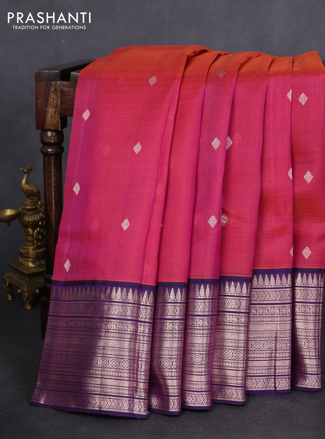 Kora kanchipuram silk saree dual shade of magenta pink and navy blue with zari woven buttas and rich zari woven border