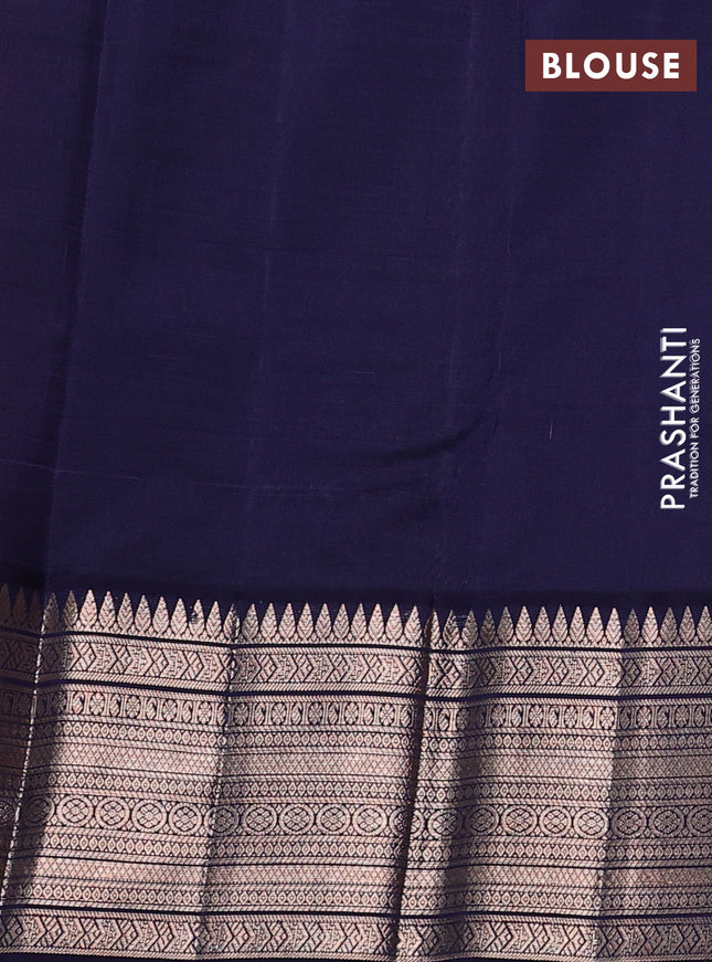 Kora kanchipuram silk saree dual shade of magenta pink and navy blue with zari woven buttas and rich zari woven border