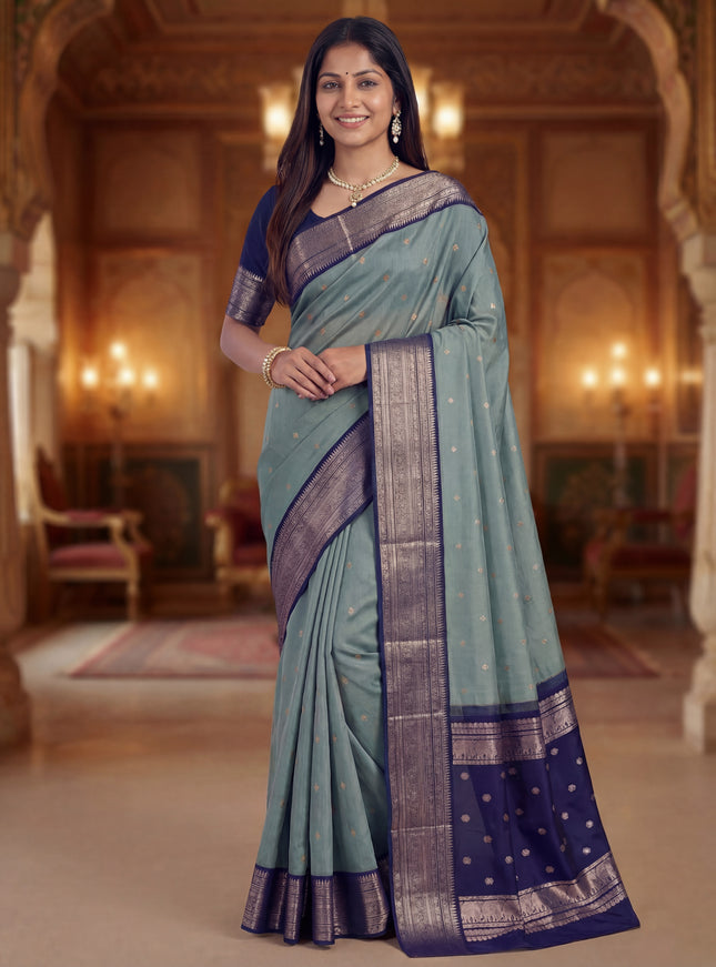 Kora kanchipuram silk saree pastel blue and navy blue with zari woven buttas and rich zari woven border