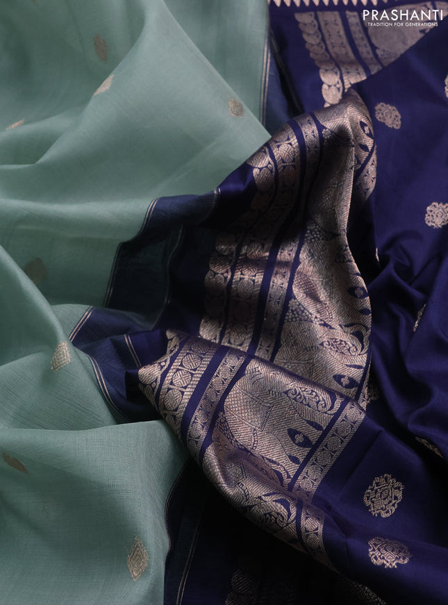 Kora kanchipuram silk saree pastel blue and navy blue with zari woven buttas and rich zari woven border