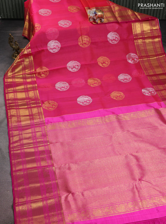 Kora kanchipuram silk saree pinkish orange and pink with silver & gold zari woven buttas and long rich zari woven border
