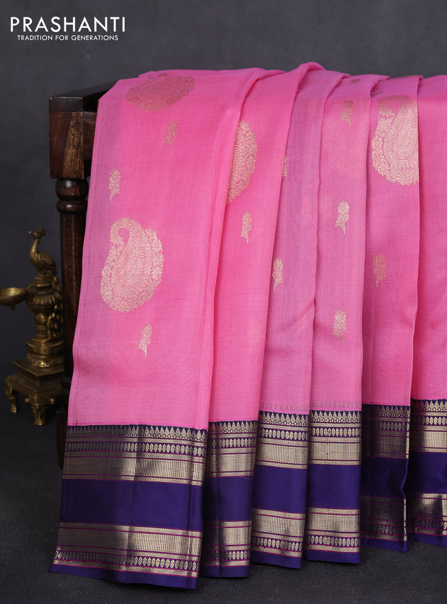 Kora kanchipuram silk saree pink and dark blue with zari woven buttas and rettapet zari woven border