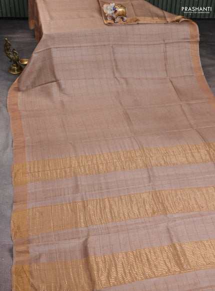 Pure tussar silk saree beige and teal green with allover zari woven checked pattern and zari woven border
