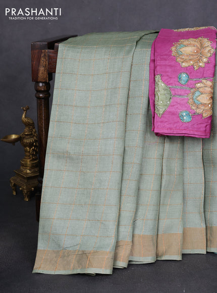 Pure tussar silk saree pastel green and purple shade with allover zari woven checked pattern and zari woven border